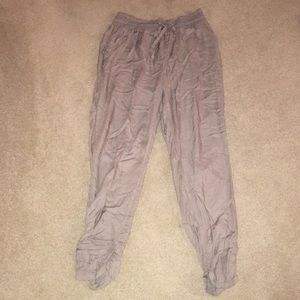 tan pants scrunched at bottom